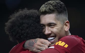 LONDON, ENGLAND - JANUARY 11: Roberto Firmino celebrates with Mo Salah after scoring the winning goal for Liverpool FC during the Premier League match between Tottenham Hotspur and Liverpool FC at Tottenham Hotspur Stadium on January 11, 2020 in London, United Kingdom. (Photo by Visionhaus)