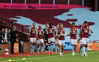 BIRMINGHAM, ENGLAND - JUNE 17: Players of Aston Villa walk out on the pitch as the tunnel is shared the teams are required to walk out separately during the Premier League match between Aston Villa and Sheffield United at Villa Park on June 17, 2020 in Birmingham, United Kingdom. (Photo by Matthew Ashton - AMA/Getty Images)