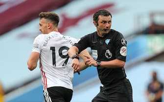 BIRMINGHAM, ENGLAND - JUNE 17: Orjan Nyland of Aston Villa fumbles and pulls the ball from being the line but Referee Michael Oliver call a no goal as the goal line technology fails during the Premier League match between Aston Villa and Sheffield United at Villa Park on June 17, 2020 in Birmingham, United Kingdom. (Photo by Matthew Ashton - AMA/Getty Images)