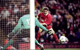 20 Feb 1999:  Michael Owen of Liverpool drives a shot at West Ham United keeper Shaka Hislop in the FA Carling Premiership match at Anfield in Liverpool. The game ended in a 2-2 draw. \ Mandatory Credit: Clive Brunskill /Allsport