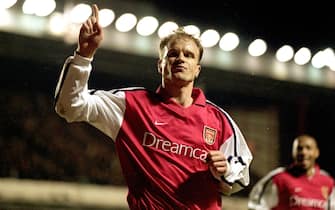 21 Feb 2001:  Dennis Bergkamp of Arsenal celebrates opening the scoring during the UEFA Champions League Group C match against Lyon played at Highbury, in London. The match ended in a 1-1 draw. \ Mandatory Credit: Mark Thompson /Allsport
