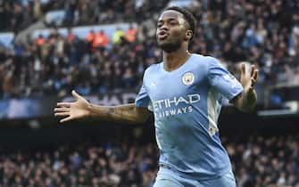 epa09595716 Raheem Sterling of Manchester City celebrates after scoring the 1-0 lead during the English Premier League match between Manchester City and Everton in Manchester, Britain, 21 November 2021.  EPA/PETER POWELL EDITORIAL USE ONLY. No use with unauthorized audio, video, data, fixture lists, club/league logos or 'live' services. Online in-match use limited to 120 images, no video emulation. No use in betting, games or single club/league/player publications