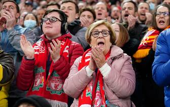 Liverpool fans clap on the 7th minute in mark or respect to Cristiano Ronaldo following the death of his new-born son during the Premier League match at Anfield, Liverpool. Picture date: Tuesday April 19, 2022. (Photo by Mike Egerton/PA Images via Getty Images)