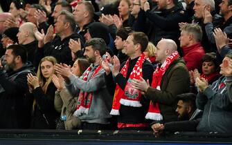 Liverpool fans clap on the 7th minute in mark or respect to Cristiano Ronaldo following the death of his new-born son during the Premier League match at Anfield, Liverpool. Picture date: Tuesday April 19, 2022. (Photo by Mike Egerton/PA Images via Getty Images)