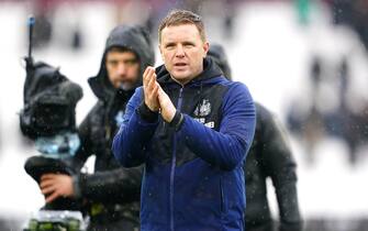 Newcastle United manager Eddie Howe applauds the fans after the Premier League match at the London Stadium, London. Picture date: Saturday February 19, 2022.