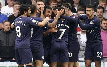 Manchester City's Nathan Ake (centre) celebrates scoring their side's second goal of the game with team-mates during the Premier League match at Elland Road, Leeds. Picture date: Saturday April 30, 2022.