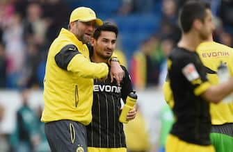 SINSHEIM, GERMANY - MAY 02:  Head coach Juergen Klopp of Dortmund jokes with Ilkay Guendogan of Dortmund after the Bundesliga match between 1899 Hoffenheim and Borussia Dortmund at Wirsol Rhein-Neckar-Arena on May 2, 2015 in Sinsheim, Germany.  (Photo by Matthias Hangst/Bongarts/Getty Images)