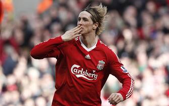 Liverpool's Fernando Torres celebrates after scoring the opening goal of the game