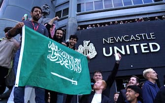 Newcastle United fans celebrate at St James' Park following the announcement that The Saudi-led takeover of Newcastle has been approved. Picture date: Thursday October 7, 2021.