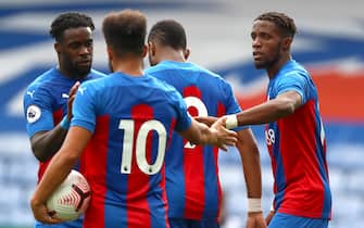 LONDON, ENGLAND - SEPTEMBER 05: Wilfred Zaha of Crystal Palace celebrates scoring his teams first goalduring the Pre Season Friendly match between Crystal Palace and Brondby IF at Selhurst Park on September 05, 2020 in London, England. (Photo by Chloe Knott - Danehouse/Getty Images)