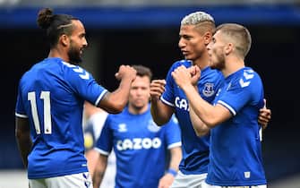 LIVERPOOL, ENGLAND - SEPTEMBER 05: Jonjo Kenny of Everton celebrates with Theo Walcott and Richarlison after scoring the first goal of the game during the pre-season friendly match between Everton and Preston North End at Goodison Park on September 05, 2020 in Liverpool, England. (Photo by Nathan Stirk/Getty Images)