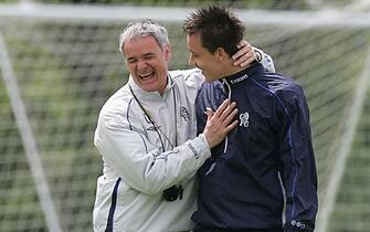 50810600 LONDON - MAY 7: Claudio Ranieri, manager of Chelsea shares a joke with John Terry during a training session at the Harlington training ground on May 7, 2004 in London. (Photo by Phil Cole/Getty Images)
