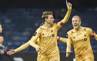 epa08836637 Kasper Junker celebrates after he scores (1-0) during the match against Stromsgodset  at Marienlyst Stadium in Drammen, Norway, 22 November 2020. Bodo/Glimt won the League Championship and is the most northern club to be Norwegian champion.  EPA/Fredrik Varfjell NORWAY OUT