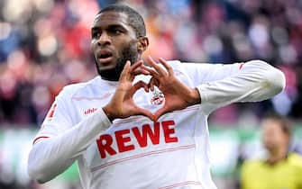 epa09730171 Cologne's Anthony Modeste celebrates after scoring the opening goal during the German Bundesliga soccer match between FC Koeln and SC Freiburg in Cologne, Germany, 05 February 2022.  EPA/SASCHA STEINBACH CONDITIONS - ATTENTION: The DFL regulations prohibit any use of photographs as image sequences and/or quasi-video.