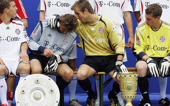 MUNICH, GERMANY - AUGUST 02:  Goalkeeper Bernd Drehe (2nd-L) and goalkeeper Michael Rensing (2nd-R) chat during the Bundesliga 1st Team Presentation of  FC Bayern Munich at Bayern's training ground Saebener Strasse on August  2, 2006 in Munich, Germany.  (Photo by Sandra Behne/Bongarts/Getty Images)