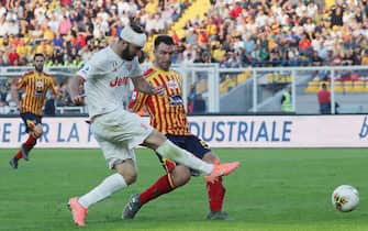 Filippo Falco of Lecce competes for the ball with Miralem Pjanic of Juventus during the Serie A match between US Lecce and Juventus at Stadio Via del Mare on October 27, 2019 in Lecce, Italy.