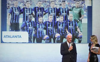 MILAN, ITALY - DECEMBER 02: (L) Antonio Percassi president of Atalanta receives the best team award during the 'Oscar del Calcio AIC' Italian Football Awards on December 2, 2019 in Milan, Italy. (Photo by Pier Marco Tacca/Getty Images)