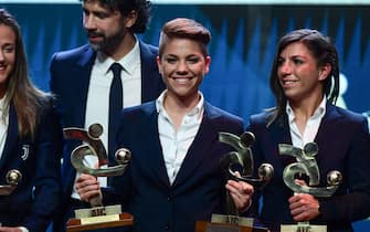 Roma's Italian midfielder Manuela Giugliano (C) reacts after receiving the Award for Best Female Player of the Year during the 'Gran Gala del Calcio' awards ceremony, organised by the Italian Footballers' Association (AIC), on December 2, 2019, in Milan. (Photo by MIGUEL MEDINA / AFP) (Photo by MIGUEL MEDINA/AFP via Getty Images)