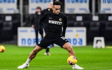 Inter Milan's Argentinian forward Lautaro Martinez warms up prior to the Italian Serie A football match Inter Milan vs AS Rome on December 6, 2019 at the San Siro stadium in Milan. (Photo by Miguel MEDINA / AFP) (Photo by MIGUEL MEDINA/AFP via Getty Images)