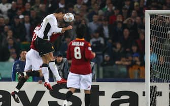 ROME - APRIL 01: Cristiano Ronaldo of Manchester United scores the opening goal during the UEFA Champions League Quarter Final, first leg match between AS Roma and Manchester United at the Olympic Stadium on April 1, 2008 in Rome, Italy. (Photo by Alex Livesey/Getty Images)