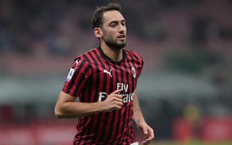 MILAN, ITALY - NOVEMBER 03:  Hakan Calhanoglu of AC Milan looks on during the Serie A match between AC Milan and SS Lazio at Stadio Giuseppe Meazza on November 3, 2019 in Milan, Italy.  (Photo by Emilio Andreoli/Getty Images)