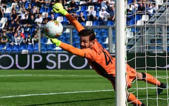 Sassuolo's Italian goalkeeper Andrea Consigli defelects a shot during the Italian Serie A football match Sassuolo vs Inter Milan on October 20, 2019 at the Mapei stadium in Reggio-Emilia. (Photo by Miguel MEDINA / AFP) (Photo by MIGUEL MEDINA/AFP via Getty Images)