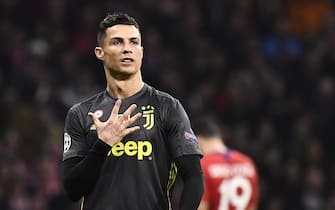 Juventus' Portuguese forward Cristiano Ronaldo gestures during the UEFA Champions League round of 16 first leg football match between Club Atletico de Madrid and Juventus FC at the Wanda Metropolitan stadium in Madrid on February 20, 2019. (Photo by PIERRE-PHILIPPE MARCOU / AFP)        (Photo credit should read PIERRE-PHILIPPE MARCOU/AFP via Getty Images)