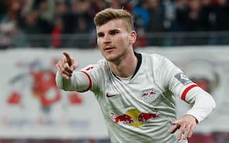 Leipzig's German forward Timo Werner celebrates scoring the opening goal during the German first division Bundesliga football match RB Leipzig v FC Cologne in Leipzig, eastern Germany, on November 23, 2019. (Photo by Odd ANDERSEN / AFP) / RESTRICTIONS: DFL REGULATIONS PROHIBIT ANY USE OF PHOTOGRAPHS AS IMAGE SEQUENCES AND/OR QUASI-VIDEO (Photo by ODD ANDERSEN/AFP via Getty Images)