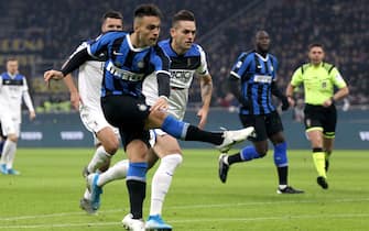 MILAN, ITALY - JANUARY 11: Lautaro MartÃ­nez of FC Internazionale scoring his goal 1-0 ,during the Serie A match between FC Internazionale and Atalanta BC at Stadio Giuseppe Meazza on January 11, 2020 in Milan, Italy. (Photo by MB Media/Getty Images)