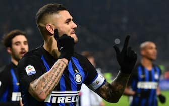 Inter Milan's Argentine forward Mauro Icardi celebrates after opening the scoring with a penalty kick during the Italian Serie A football match Inter Milan vs Udinese on December 15, 2018 at the San Siro stadium in Milan. (Photo by Miguel MEDINA / AFP)        (Photo credit should read MIGUEL MEDINA/AFP via Getty Images)