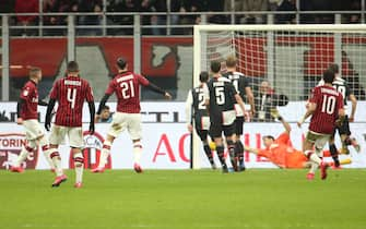 AC MilanÕs Ante Rebic (L) scores goal of 1 to 0 during the first leg of the semifinal of  Italian Coppa Italia soccer match between Ac Milan and Juventus Fc  at Giuseppe Meazza stadium in Milan 13 February   2020.
ANSA / MATTEO BAZZI