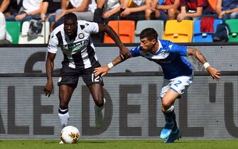 UDINE, ITALY - SEPTEMBER 21: Ken Sema of Udinese Calcio  competes for the ball with  Ales Mateju of Brescia Calcio during the Serie A match between Udinese Calcio and Brescia Calcio at Stadio Friuli on September 22, 2019 in Udine, Italy.  (Photo by Alessandro Sabattini/Getty Images)