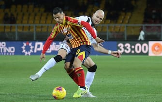 LECCE, ITALY - JANUARY 06:  Filippo Falco of Lecce competes for the ball withBram Nuytinkc of Udinese during the Serie A match between US Lecce and Udinese Calcio at Stadio Via del Mare on January 6, 2020 in Lecce, Italy.  (Photo by Maurizio Lagana/Getty Images)