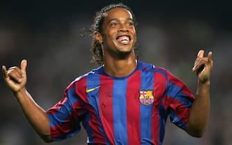 Barcelona, SPAIN:  FC Barcelona's Brazilian Ronaldinho celebrates the second goal against Real Sociedad during their Spanish League football match at the Camp Nou stadium in Barcelona, 30 October 2005. AFP PHOTO/LLUIS GENE  (Photo credit should read LLUIS GENE/AFP/Getty Images)