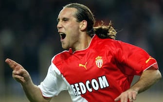 epa00158595 (FILES) Croatian national team forward Dado Prso celebrates after scoring for his club AS Monaco during a Champions League match against Deportivo la Coruna at Charle II Stadium in Monaco Tuesday 5 November 2003.  EPA/HOSLET OLIVIER