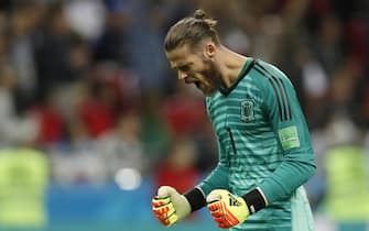 epa06825578 Goalkeeper David de Gea of Spain celebrates the 1-0 lead during the FIFA World Cup 2018 group B preliminary round soccer match between Iran and Spain in Kazan, Russia, 20 June 2018.

(RESTRICTIONS APPLY: Editorial Use Only, not used in association with any commercial entity - Images must not be used in any form of alert service or push service of any kind including via mobile alert services, downloads to mobile devices or MMS messaging - Images must appear as still images and must not emulate match action video footage - No alteration is made to, and no text or image is superimposed over, any published image which: (a) intentionally obscures or removes a sponsor identification image; or (b) adds or overlays the commercial identification of any third party which is not officially associated with the FIFA World Cup)  EPA/ROBERT GHEMENT   EDITORIAL USE ONLY