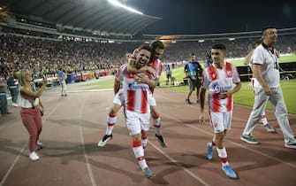SERBIA SOCCER UEFA CHAMPIONS LEAGUE QUALIFYING epa07798255 Red Star's Tomane (L), Jose Canas (C) and Mateo Garcia (R) celebrate after the UEFA Champions League playoff, second leg soccer match between BSC Young Boys and Red Star Belgrade in Belgrade, Serbia, 27 August 2019. EPA/ANDREJ CUKIC