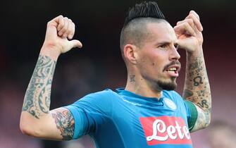 Napoli's Slovakian midfielder Marek Hamsik celebrates after scoring a goal during the Italian Serie A football match SSC Napoli vs UC Sampdoria on December 23 2017, at the San Paolo Stadium in Naples. / AFP PHOTO / CARLO HERMANN        (Photo credit should read CARLO HERMANN/AFP via Getty Images)