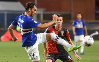 Sampdoria's Manolo Gabbiadini (L) and Genoa's Lukas Lerager (R) in action during the Italian Serie A soccer match between UC Sampdoria vs Genoa CFC at the Luigi Ferraris stadium in Genoa, Italy 22 July 2020
ANSA/LUCA ZENNARO