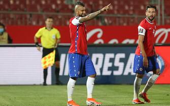 SANTIAGO, CHILE - OCTOBER 13: Arturo Vidal of Chile celebrates after scoring the first goal of his team during a match between Chile and Colombia as part of South American Qualifiers for Qatar 2022 at Estadio Nacional de Chile on October 13, 2020 in Santiago, Chile. (Photo by Claudio Reyes - Pool/Getty Images)