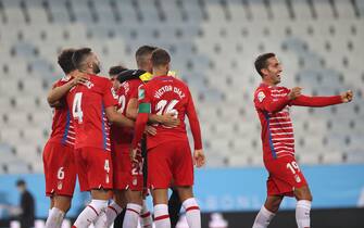 epa08713630 Granada player Angel Montoro Sanchez (R) and teammates celebrate after the UEFA Europa League playoff soccer match between Malmo FF and Granada CF at Malmo New Stadium in Malmo, Sweden, 01 October 2020.  EPA/Andreas Hillergren/TT *** SWEDEN OUT ***