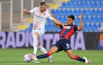 Milan's forward Ante Rebic is tackled by Crotone's defender Lisandro Magallan (R) during the italian Serie A soccer match between FC Crotone and AC Milan at the Ezio Scida stadium in Crotone, Italy, 27 September 2020.
ANSA / CARMELO IMBESI