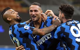 Inter Milan's Danilo D'Ambrosio (C) jubilates with his teammates after scoring the goal during the Italian Serie A soccer match Inter FC vs ACF Fiorentina at the Giuseppe Meazza stadium in Milan, Italy, 26 September 2020.
ANSA/MATTEO BAZZI