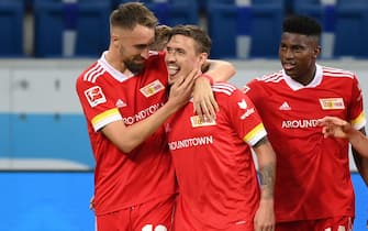 epa08794151 Max Kruse (C) of Union Berlin celebrates scoring a goal with his team mate Florian Huebner (L) during the German Bundesliga match between TSG Hoffenheim and 1. FC Union Berlin at PreZero-Arena in Sinsheim, Germany, 02 November 2020.  EPA/Matthias Hangst / POOL CONDITIONS - ATTENTION:  The DFL regulations prohibit any use of photographs as image sequences and/or quasi-video.