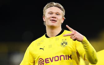 epa08840044 Erling Haaland of Borussia Dortmund celebrates after scoring their sides third goal during the UEFA Champions League Group F stage match between Borussia Dortmund and Club Brugge KV at Signal Iduna Park in Dortmund, Germany,24 November 2020.  EPA/LARS BARON / POOL