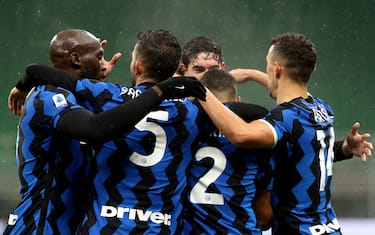 Fc Inter's Achraf Hakimi  jubilates with his teammates  after scoring goal of 2 to 0 during the Italian serie A soccer match  Fc Inter and Bologna at Giuseppe Meazza stadium in Milan 5 December  2020.
ANSA / MATTEO BAZZI