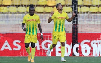 Nantes' French midfielder Ludovic Blas (R) celebrates after scoring a goal during the French L1 football match between Monaco (ASM) and Nantes (FCN) at the Louis II Stadium in Monaco on September 13, 2020. (Photo by Valery HACHE / AFP) (Photo by VALERY HACHE/AFP via Getty Images)