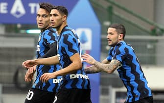 Inter Milan's Achraf Hakimi  (C) jubilates with his teammates after scoring the 1-0 goal during the Italian serie A soccer match  between Fc Inter and Spezia at Giuseppe Meazza stadium in Milan 20 December  2020.
ANSA / MATTEO BAZZI