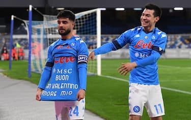 Napoli's forward Lorenzo Insigne (L) celebrates showing a t-shirt (Happy Valentine's day my love) after scoring from the penalty spot the 1-0 goal during italian Serie A soccer match SSc Napoli vs Juventus FC at the Diego Armando Maradona stadium in Naples, Italy , 13 february 2021.
ANSA / CIRO FUSCO