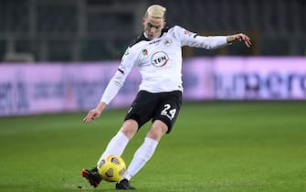 Nahuel Estevez of Spezia Calcio crosses the ball during the Serie A match at Stadio Grande Torino, Turin. Picture date: 16th January 2021. Picture credit should read: Jonathan Moscrop/Sportimage via PA Images